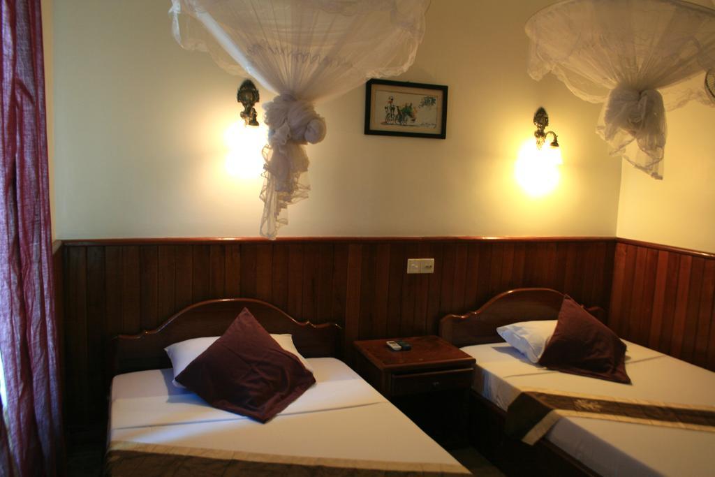 Firefly Guesthouse - The Berlin Angkor Siem Reap Zimmer foto