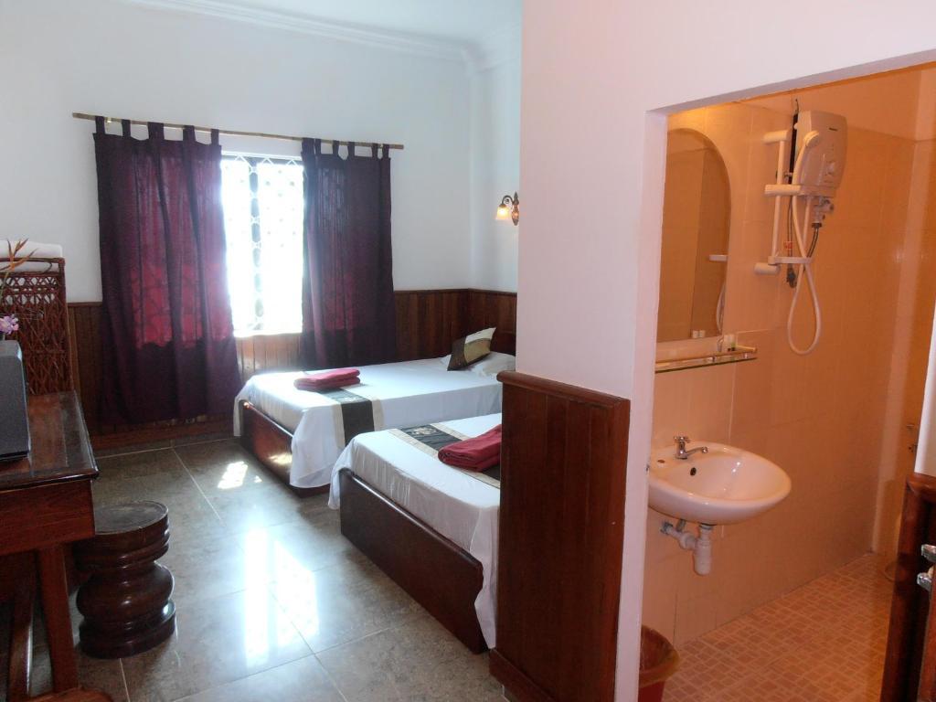 Firefly Guesthouse - The Berlin Angkor Siem Reap Zimmer foto
