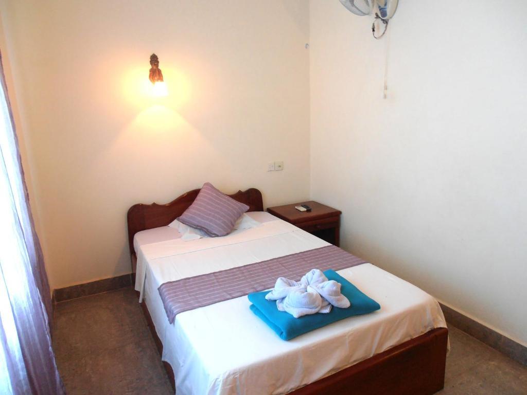 Firefly Guesthouse - The Berlin Angkor Siem Reap Zimmer foto