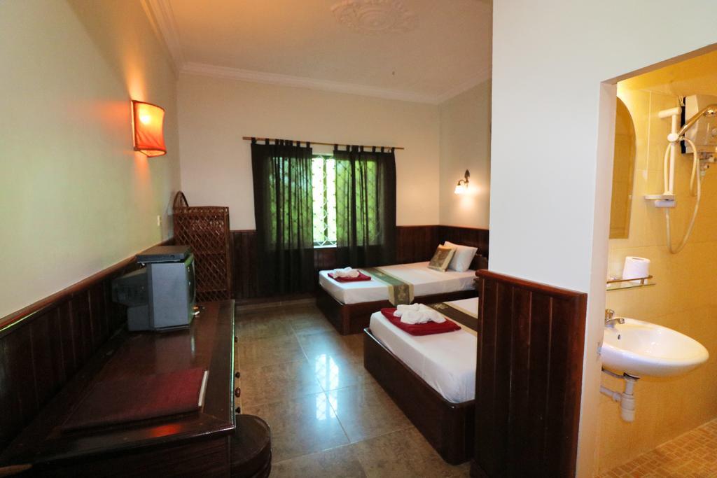 Firefly Guesthouse - The Berlin Angkor Siem Reap Zimmer foto
